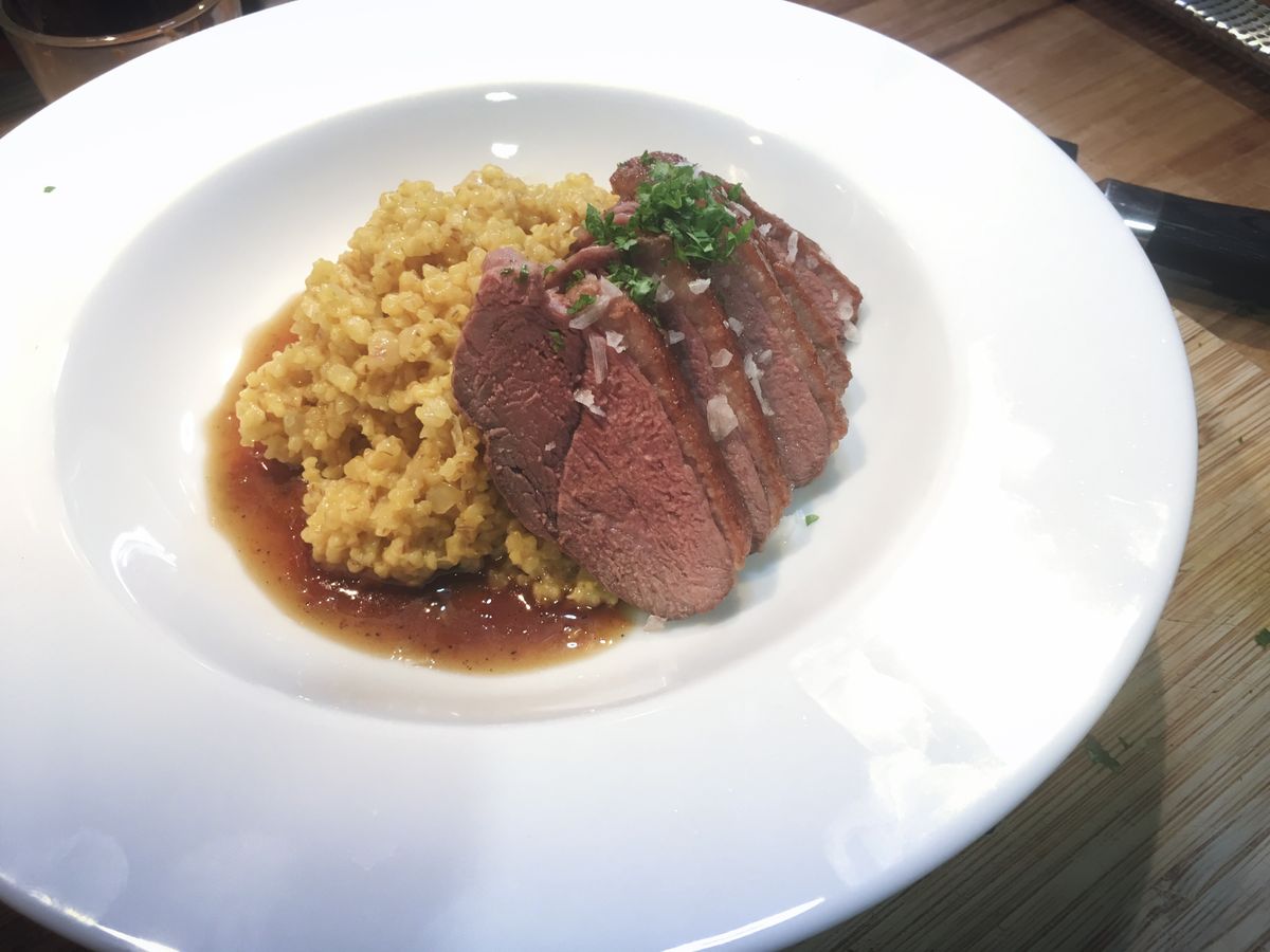 Duck à l'orange with saffron seasoned pearl barley