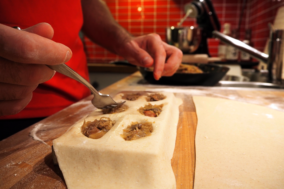 Filling the pierogi dough