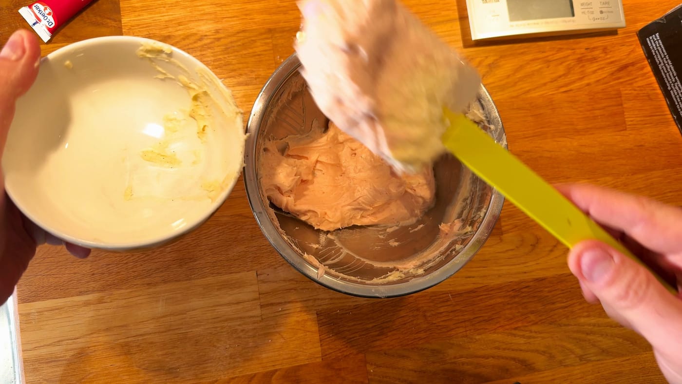 The pale pink cream, and a darker pink portion for the middle